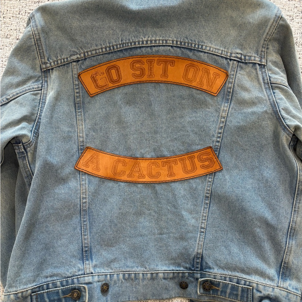 Understated Leather “Go Sit on a Cactus” Denim Jacket